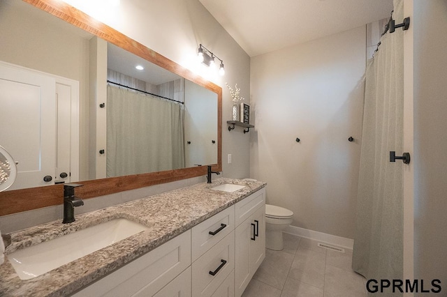 1600 W Avalanche Rd, Lincoln, NE 68521 - bathroom with double vanity and tile patterned floors