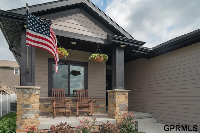 1600 W Avalanche Rd, Lincoln, NE 68521 - entrance to property with covered porch and stone siding