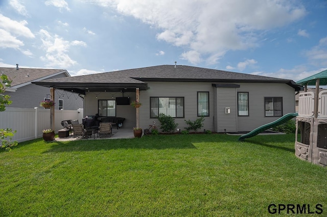1600 W Avalanche Rd, Lincoln, NE 68521 - rear view of property with a playground, a patio, outdoor lounge area, and a shingled roof