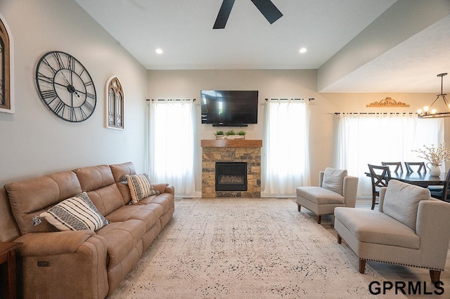 1600 W Avalanche Rd, Lincoln, NE 68521 - living area featuring ceiling fan, a chandelier, a fireplace, and recessed lighting