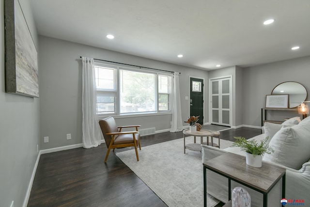 1210 S 44th St, Lincoln, NE 68510 - living room with recessed lighting and dark wood-type flooring