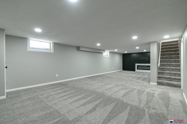 1210 S 44th St, Lincoln, NE 68510 - below grade area with carpet flooring, recessed lighting, and stairs