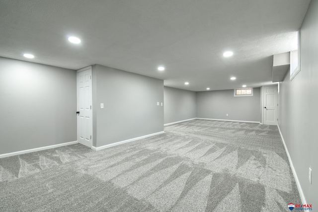 1210 S 44th St, Lincoln, NE 68510 - finished below grade area with recessed lighting and carpet flooring