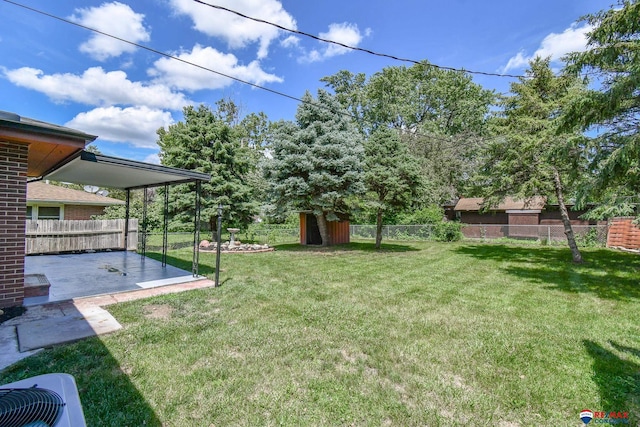 1210 S 44th St, Lincoln, NE 68510 - fenced backyard with a patio and a storage unit