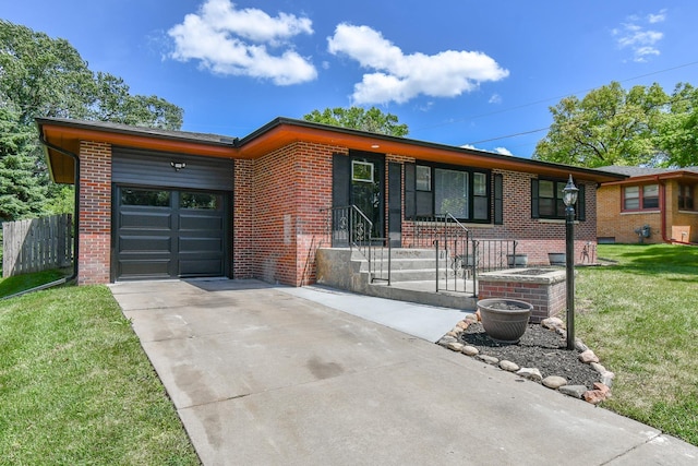 1210 S 44th St, Lincoln, NE 68510 - single story home featuring brick siding, driveway, and an attached garage