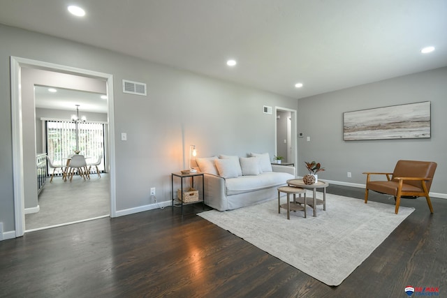 1210 S 44th St, Lincoln, NE 68510 - living room featuring dark wood finished floors, recessed lighting, and a chandelier