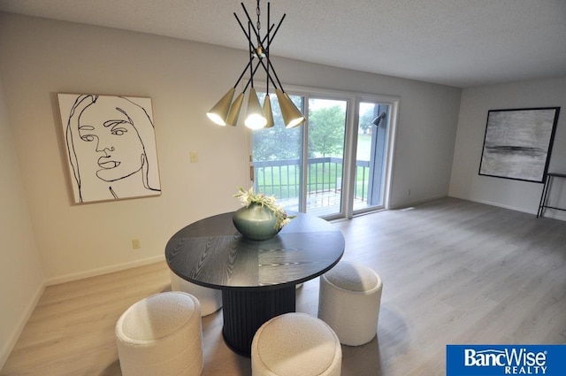 7101 S St Unit 1, Lincoln, NE 68506 - dining room with light wood-style flooring and a textured ceiling