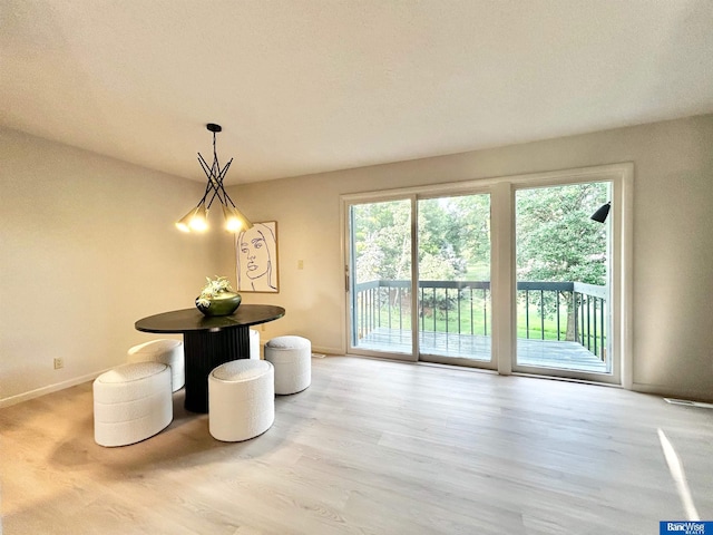7101 S St Unit 1, Lincoln, NE 68506 - dining area featuring plenty of natural light and wood finished floors