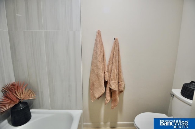 7101 S St Unit 1, Lincoln, NE 68506 - bathroom with toilet and a tub to relax in