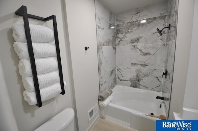 7101 S St Unit 1, Lincoln, NE 68506 - full bathroom with bathtub / shower combination and wood finished floors