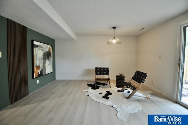 7101 S St Unit 1, Lincoln, NE 68506 - living area with wood finished floors and baseboards