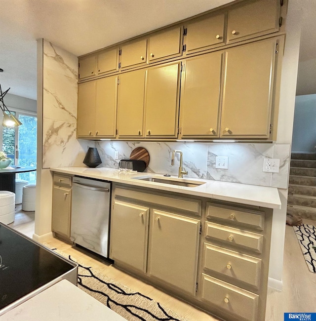 7101 S St Unit 1, Lincoln, NE 68506 - kitchen with dishwasher, light wood-type flooring, light countertops, tasteful backsplash, and electric stove
