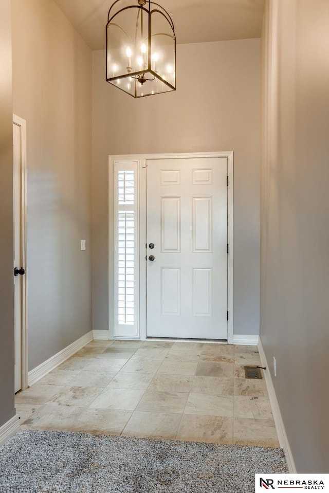 8023 S 193rd St, Gretna, NE 68028 - foyer featuring a chandelier and baseboards