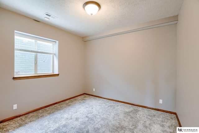 8023 S 193rd St, Gretna, NE 68028 - empty room featuring carpet flooring and a textured ceiling