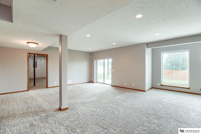 8023 S 193rd St, Gretna, NE 68028 - carpeted empty room with a textured ceiling and recessed lighting