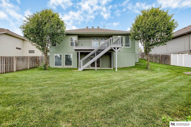 8023 S 193rd St, Gretna, NE 68028 - rear view of property featuring stairway, a fenced backyard, and a deck