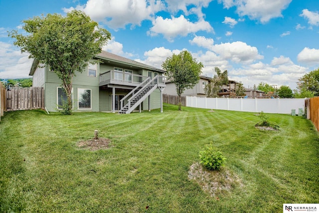 8023 S 193rd St, Gretna, NE 68028 - fenced backyard with a deck and stairway