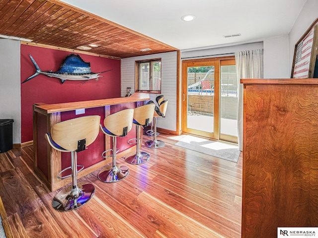 7533 Sherman St, Lincoln, NE 68506 - indoor dry bar featuring wood finished floors and recessed lighting