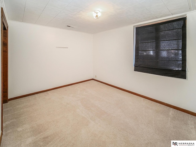 7533 Sherman St, Lincoln, NE 68506 - carpeted spare room with baseboards