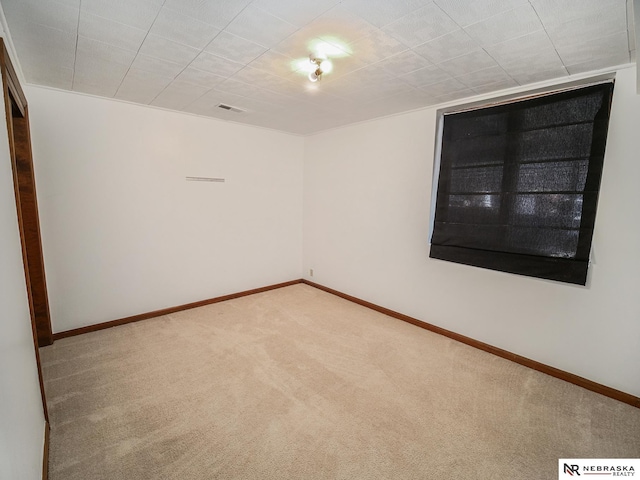 7533 Sherman St, Lincoln, NE 68506 - unfurnished room with carpet flooring and baseboards