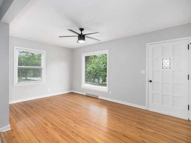 5075 Frances St, Omaha, NE 68106 - unfurnished room featuring a ceiling fan and light wood finished floors