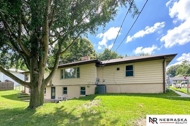 1113 S 94th St, Omaha, NE 68124 - back of house with a chimney