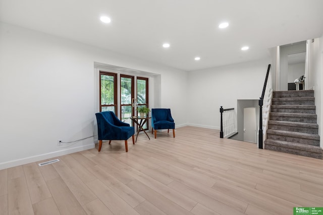 203 S 150th Cir, Omaha, NE 68154 - living area with light wood finished floors, recessed lighting, and stairs