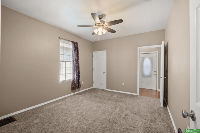 4516 S 33rd St, Omaha, NE 68107 - unfurnished bedroom featuring carpet and ceiling fan