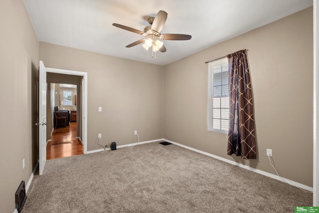 4516 S 33rd St, Omaha, NE 68107 - carpeted empty room with ceiling fan and baseboards
