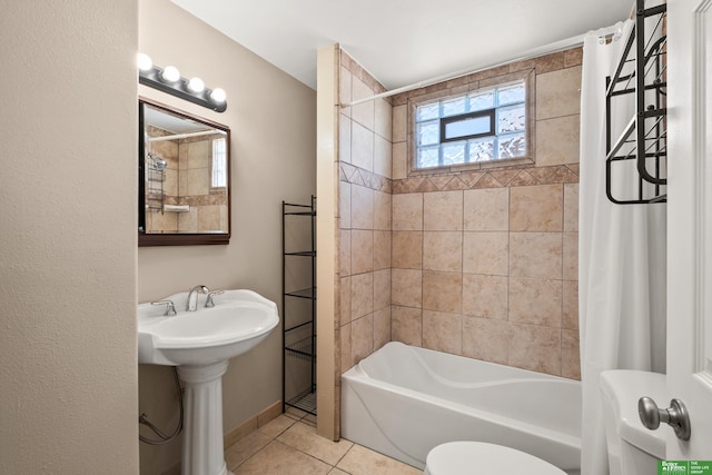4516 S 33rd St, Omaha, NE 68107 - full bathroom with shower / bath combo and tile patterned flooring