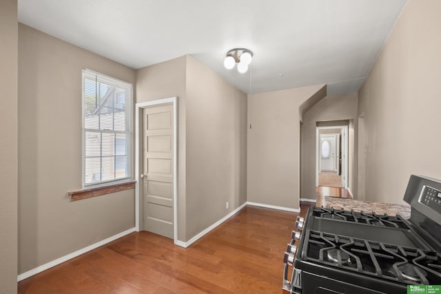 4516 S 33rd St, Omaha, NE 68107 - kitchen featuring stainless steel gas range and wood finished floors