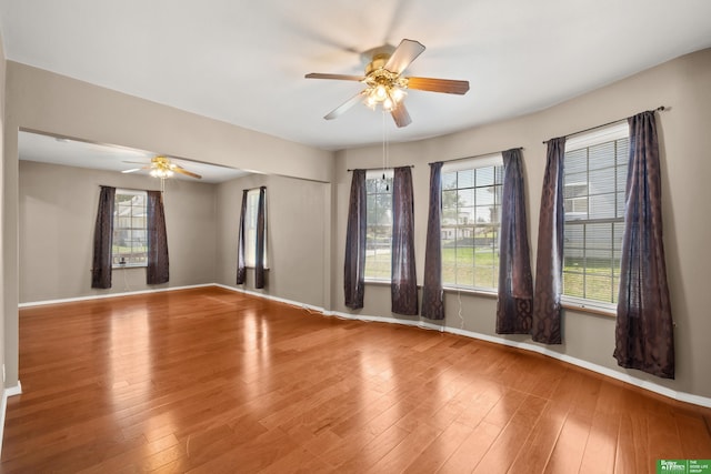 4516 S 33rd St, Omaha, NE 68107 - unfurnished room with a ceiling fan and wood finished floors