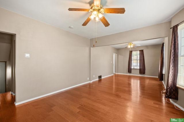 4516 S 33rd St, Omaha, NE 68107 - spare room featuring ceiling fan, wood finished floors, and a smoke detector