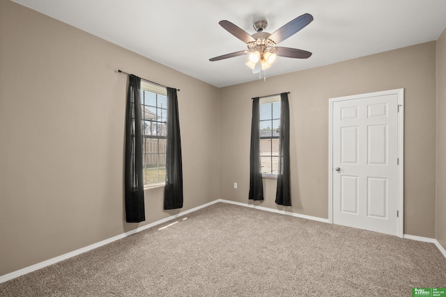 4516 S 33rd St, Omaha, NE 68107 - carpeted spare room featuring ceiling fan and baseboards