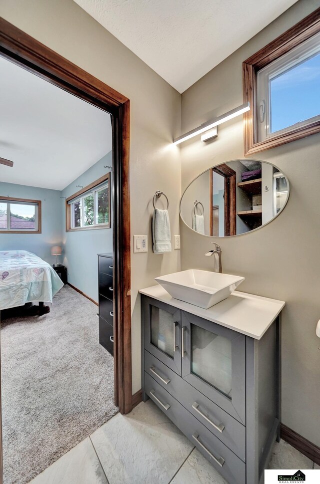 4721 Woodhaven Dr, Lincoln, NE 68516 - bathroom with vanity and ensuite bath