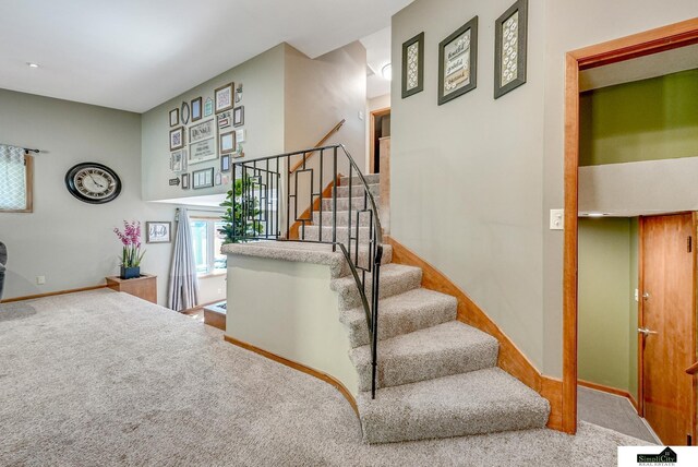 4721 Woodhaven Dr, Lincoln, NE 68516 - stairs featuring carpet and baseboards