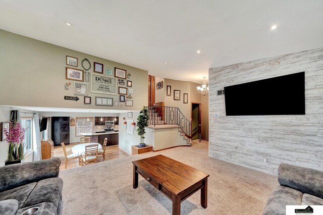 4721 Woodhaven Dr, Lincoln, NE 68516 - living room with stairway, a chandelier, and recessed lighting