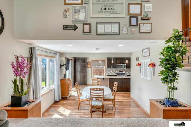 4721 Woodhaven Dr, Lincoln, NE 68516 - dining area with light wood finished floors and recessed lighting