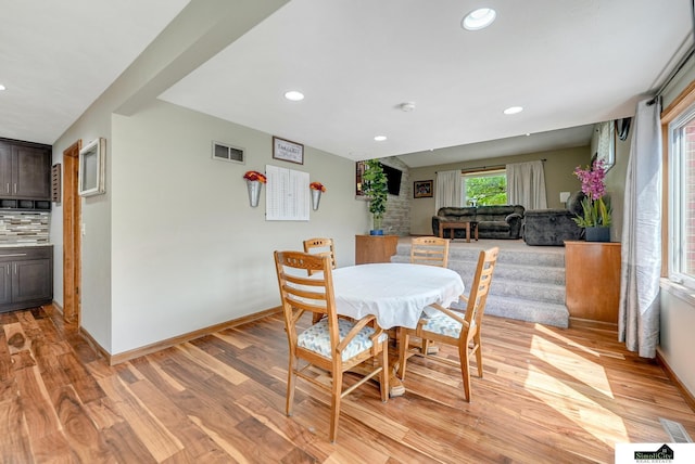 4721 Woodhaven Dr, Lincoln, NE 68516 - dining room with light wood-style flooring and recessed lighting