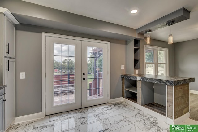 4317 S 37th St, Omaha, NE 68107 - doorway with french doors, recessed lighting, and light marble finish floors