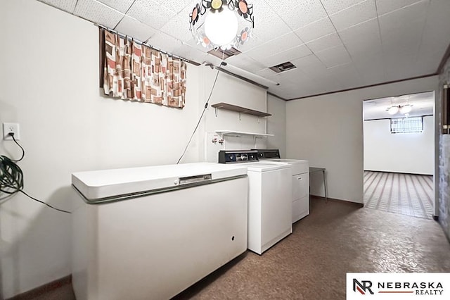4520 Polk St, Omaha, NE 68117 - laundry area with separate washer and dryer