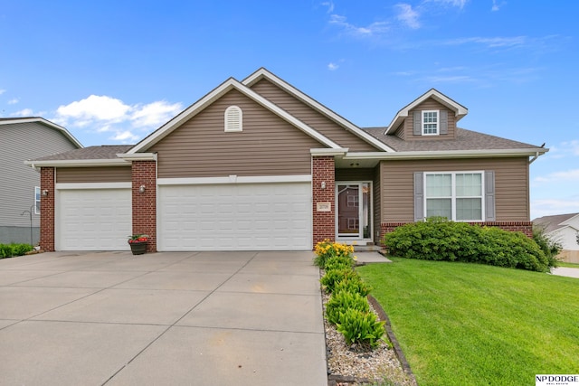 20709 Larimore Ave, Elkhorn, NE 68022 - view of front of property featuring a garage, brick siding, concrete driveway, a front yard, and a shingled roof