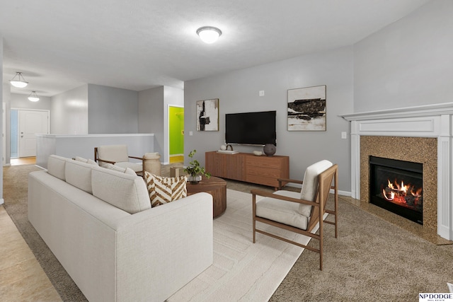 20709 Larimore Ave, Elkhorn, NE 68022 - living room featuring a tiled fireplace and light colored carpet