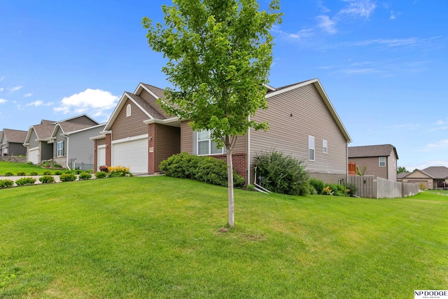 20709 Larimore Ave, Elkhorn, NE 68022 - view of front of home featuring an attached garage, brick siding, and a residential view