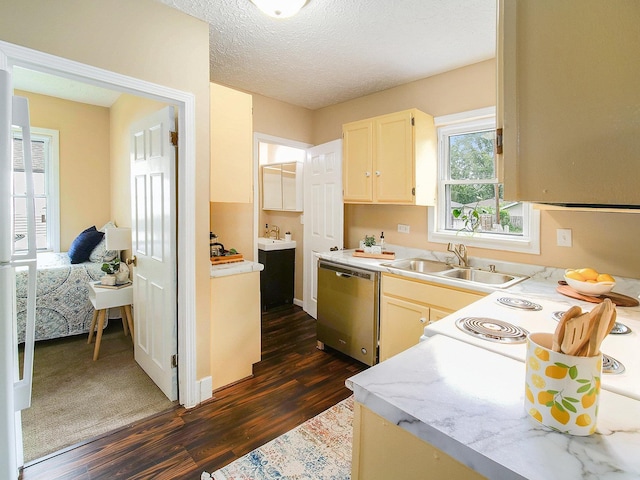 4308 N 70th St, Lincoln, NE 68507 - kitchen featuring dishwasher, dark wood finished floors, light countertops, electric range, and a textured ceiling