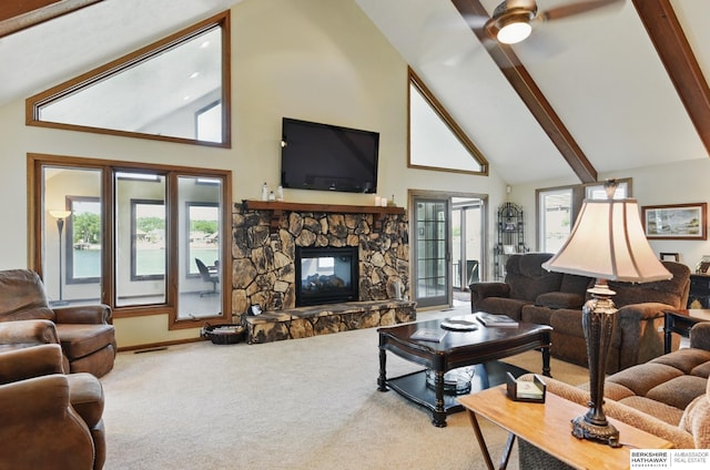 2618 Platte River Dr, Bellevue, NE 68123 - living room featuring high vaulted ceiling, carpet floors, healthy amount of natural light, beam ceiling, and a fireplace