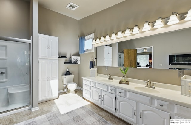 2618 Platte River Dr, Bellevue, NE 68123 - bathroom with double vanity, a stall shower, and tile patterned flooring