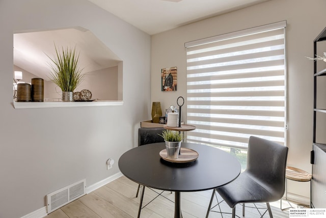 534 Piedmont Dr, Omaha, NE 68154 - dining area featuring plenty of natural light and wood finished floors