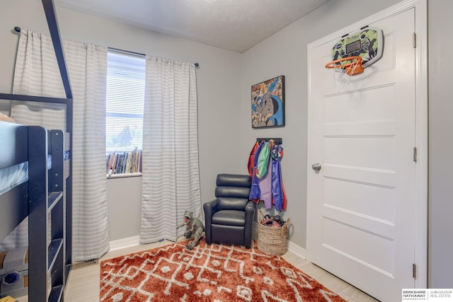 534 Piedmont Dr, Omaha, NE 68154 - living area with baseboards and a textured ceiling
