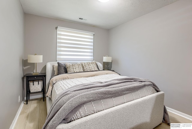 534 Piedmont Dr, Omaha, NE 68154 - bedroom with wood finished floors and baseboards